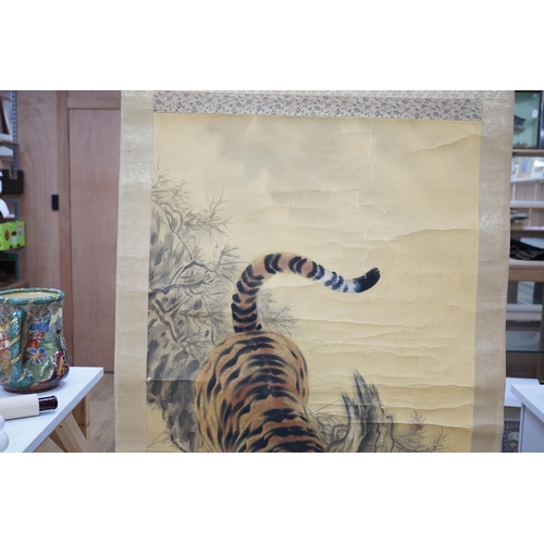 1328 - A Japanese tiger scroll painting. Condition - fair