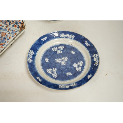 1329 - A Chinese blue and white teapot and cover, a prunus dish and an Imari patterned dish, all 18th centu... 