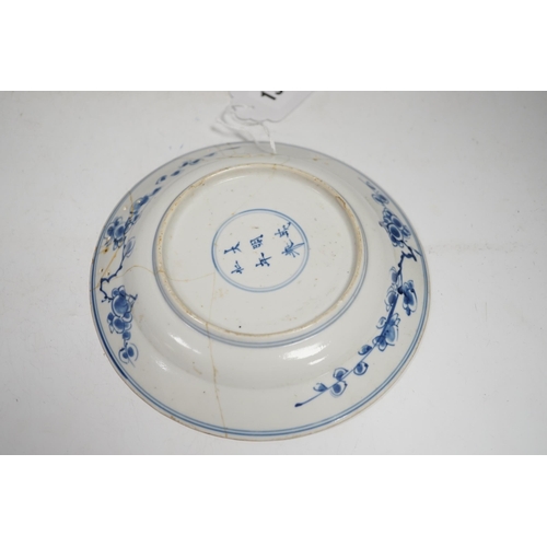 1329 - A Chinese blue and white teapot and cover, a prunus dish and an Imari patterned dish, all 18th centu... 