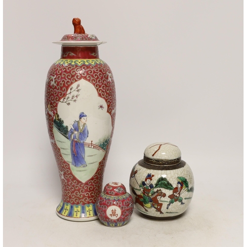 1337 - An early 20th century Chinese famille rose vase and cover, a similar small jar and cover and a famil... 