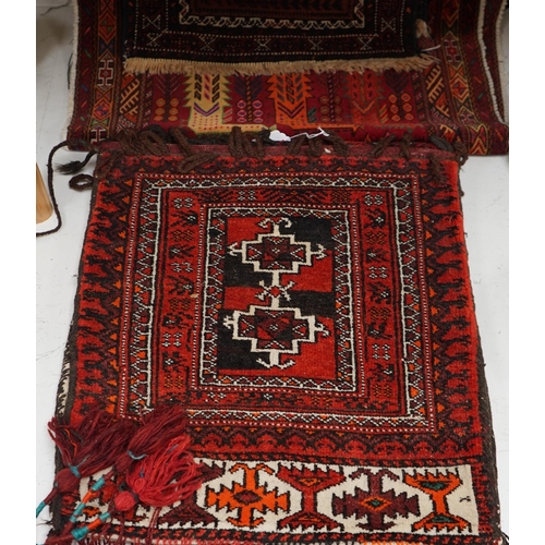 1342 - A saddle bag and two prayer rugs. Condition - fair