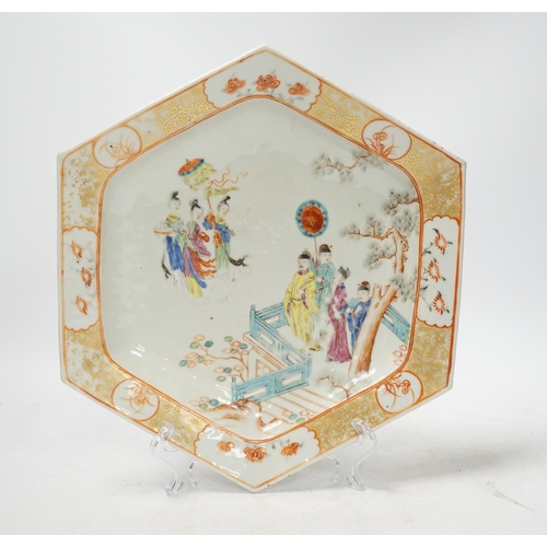 1353 - An 18th century Chinese hexagonal dish, painted with figures on a terrace, 28cm wide. Condition - fa... 