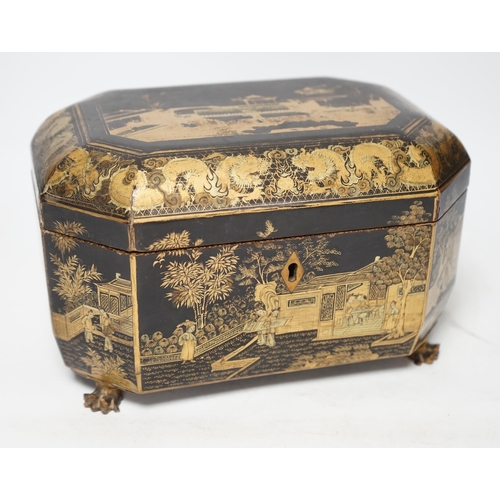 1367 - A mid 19th century Chinese export black and gold lacquer tea caddy, retaining engraved pewter tea ca... 