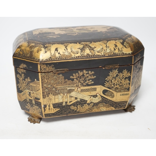 1367 - A mid 19th century Chinese export black and gold lacquer tea caddy, retaining engraved pewter tea ca... 