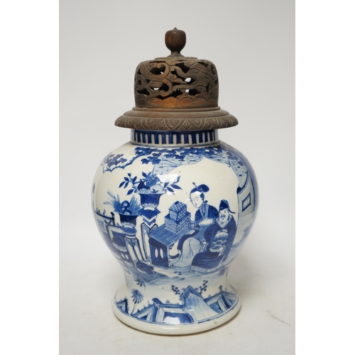 1369 - A 19th century Chinese blue and white baluster jar, painted with a dignitary and attendants at a tab... 