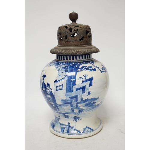 1369 - A 19th century Chinese blue and white baluster jar, painted with a dignitary and attendants at a tab... 