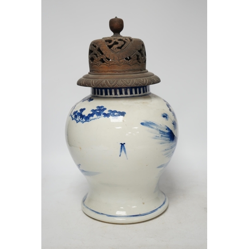 1369 - A 19th century Chinese blue and white baluster jar, painted with a dignitary and attendants at a tab... 