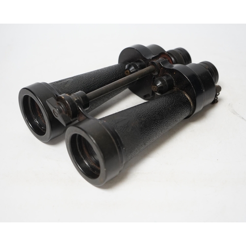 1375 - A pair of brown leather cased WWII Naval binoculars, Barr & Stroud, binoculars 24cm long, Condition ... 