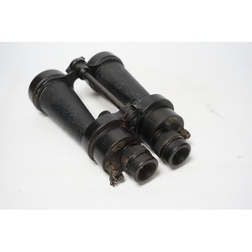 1375 - A pair of brown leather cased WWII Naval binoculars, Barr & Stroud, binoculars 24cm long, Condition ... 