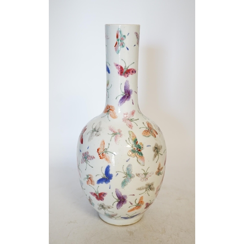 1394 - A Chinese famille rose butterflies vase, 29cm high. Condition - good