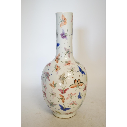 1394 - A Chinese famille rose butterflies vase, 29cm high. Condition - good