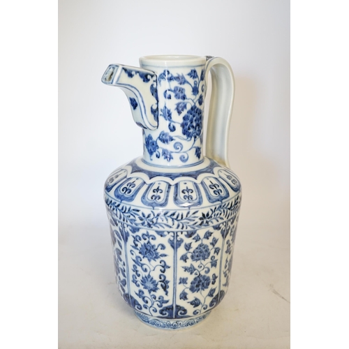 1397 - A Chinese blue and white monks cap ewer, 34cm high. Condition - good