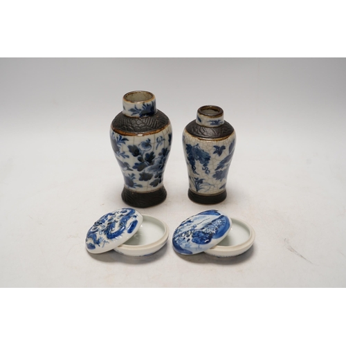 1411 - Chinese blue and white ceramics comprising crackle glaze vases and circular seal pots (4). Condition... 