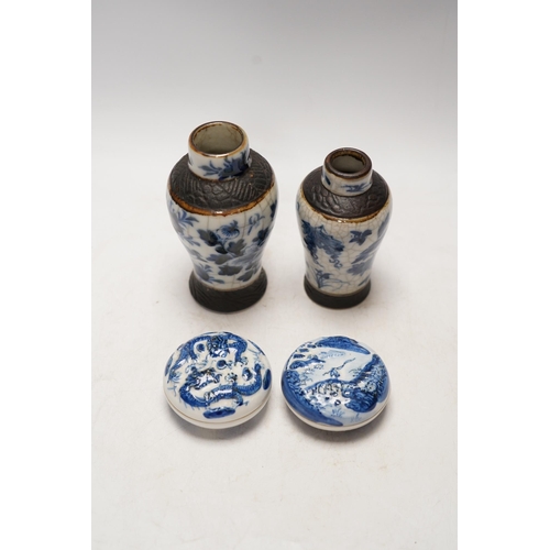 1411 - Chinese blue and white ceramics comprising crackle glaze vases and circular seal pots (4). Condition... 