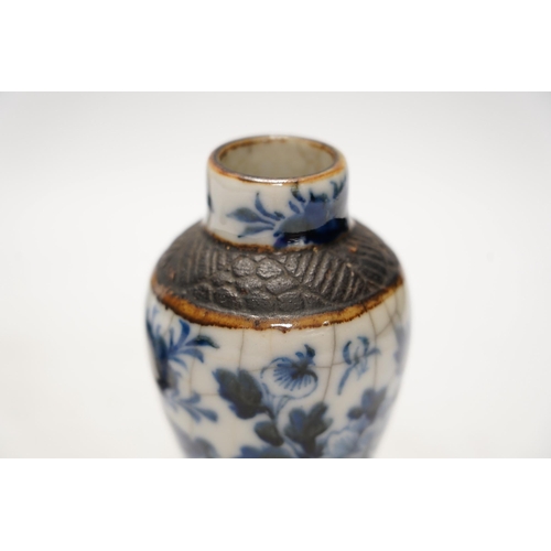 1411 - Chinese blue and white ceramics comprising crackle glaze vases and circular seal pots (4). Condition... 