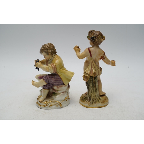 1412 - Two Meissen porcelain figures, boys with grapes, largest 13cm high. Condition - poor