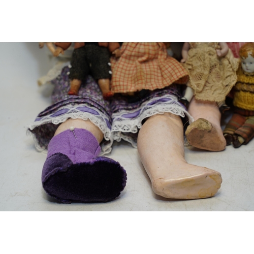 1418 - An AM bisque headed doll, an SFBT 60 bisque doll and four miniature dolls. Condition - poor to fair... 