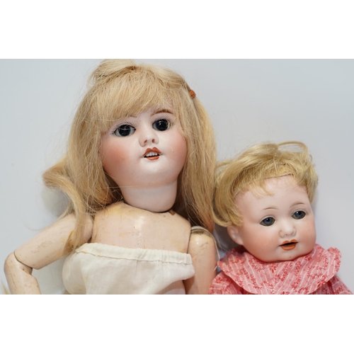 1418 - An AM bisque headed doll, an SFBT 60 bisque doll and four miniature dolls. Condition - poor to fair... 