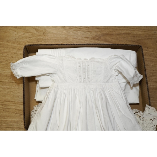 1425 - An early 20th century christening gown, a later crocheted cover, various bobbin lace collars, silk M... 