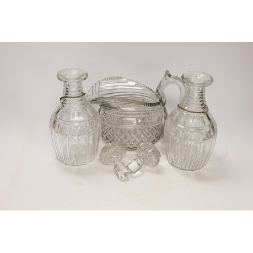 1439 - A Regency hobnail and slice cut jug and a pair of Regency cut glass mallet shaped decanters with P... 