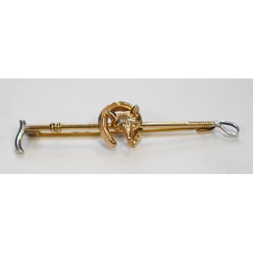 1951 - A 9ct and white metal fox head and riding crop tie pin, 56mm, gross weight 2.5 grams. Condition - go... 