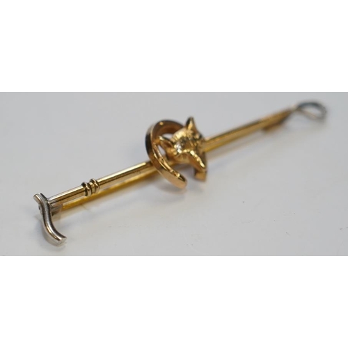 1951 - A 9ct and white metal fox head and riding crop tie pin, 56mm, gross weight 2.5 grams. Condition - go... 