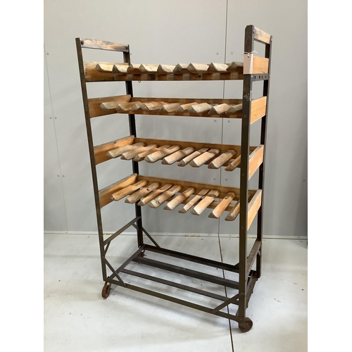 114 - An early 20th century French slatted wrought iron baker's rack, width 81cm, depth 40cm, height 137cm... 