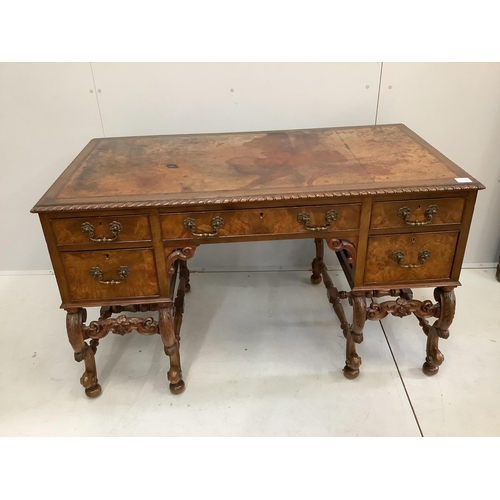 118 - A Queen Anne Revival mahogany kneehole desk, width 129cm, depth 68cm, height 77cm.  Condition - fair... 