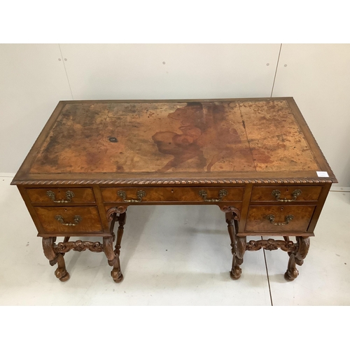 118 - A Queen Anne Revival mahogany kneehole desk, width 129cm, depth 68cm, height 77cm.  Condition - fair... 