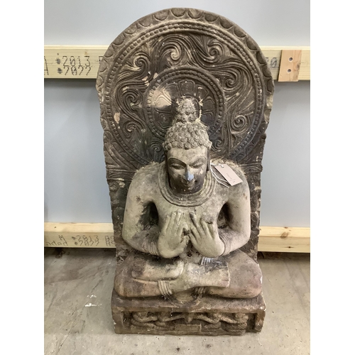 124 - A South East Asian carved stone Buddha, width 39cm, height 79cm. Condition - good