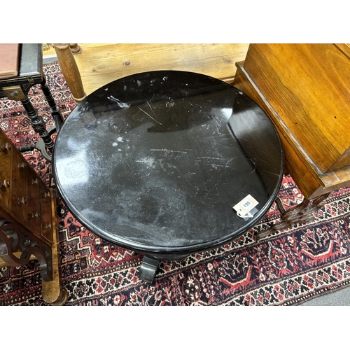 138 - An Art Deco ebonised circular occasional table, diameter 71cm, height 72cm. Condition - poor