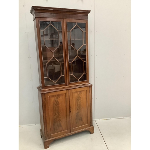 14 - A George III style mahogany bookcase cupboard, width 86cm, 36cm, height 203cm. Condition - fair... 
