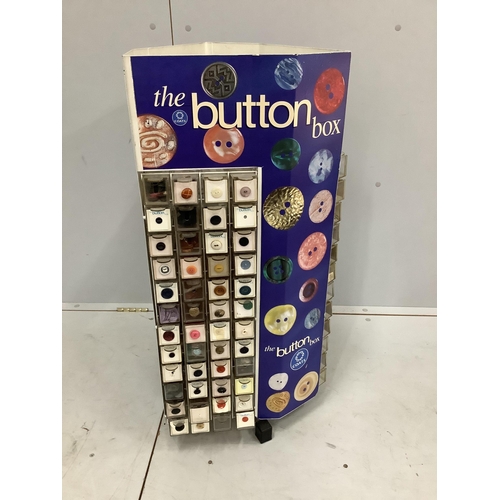 2 - A Coats 'button box haberdasher's button display carousel, with a quantity of assorted buttons, wid... 