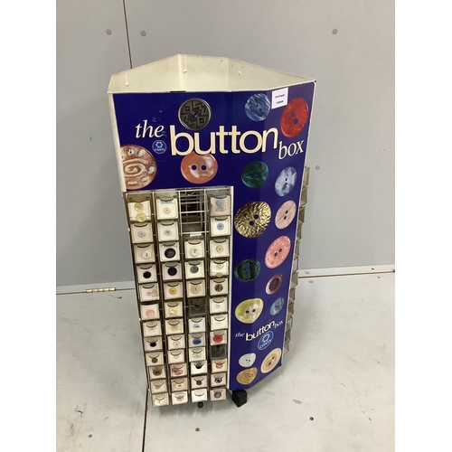 2 - A Coats 'button box haberdasher's button display carousel, with a quantity of assorted buttons, wid... 