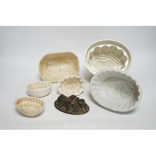 268 - From the Studio of Fred Cuming. Seven jelly moulds including six ceramic examples, one Cetemware, la... 