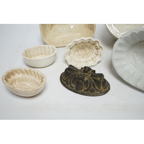 268 - From the Studio of Fred Cuming. Seven jelly moulds including six ceramic examples, one Cetemware, la... 