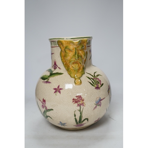 272 - From the Studio of Fred Cuming. A large crackle glaze pottery mask jug, 29cm high. Condition - good ... 