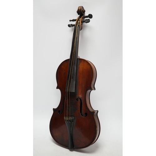 318 - A late 19th century three quarter length violin with label; 'Medio-Fino', back measures 33cm. Condit... 