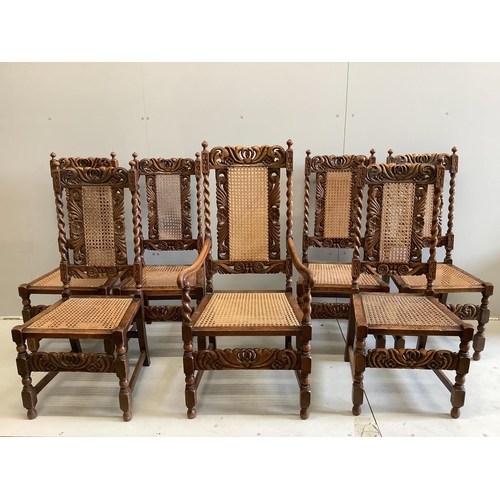 32 - A set of seven Jacobean Revival caned oak dining chairs, one with arms. Condition - fair