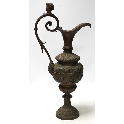 322 - A Cellini style bronze ewer, possibly converted to a lamp later, decorated with putti panel and head... 