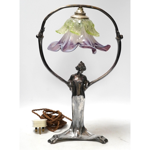 323 - An Art Nouveau WMF pewter and glass flower shade lamp, 39cm high. Condition - split to base on one l... 