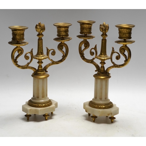 327 - A pair of late 19th century alabaster and gilt metal two light candelabra, 22cm. Condition - good... 