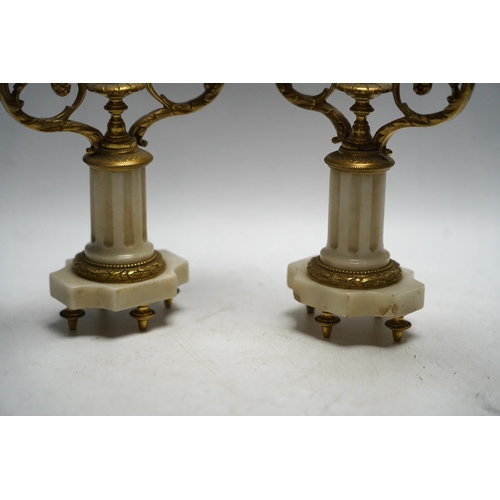 327 - A pair of late 19th century alabaster and gilt metal two light candelabra, 22cm. Condition - good... 