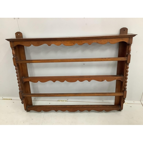 33 - A small early 20th century mahogany plate rack, width 104cm, height 82cm. Condition - fair
