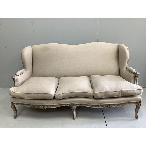 39 - A Louis XVI style painted upholstered settee, width 180cm, depth 70cm, height 93cm.  Condition - goo... 