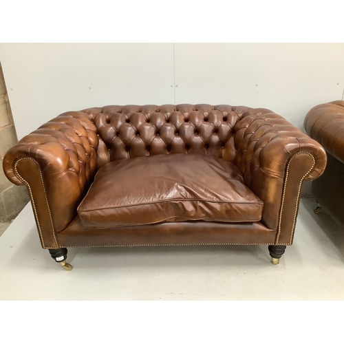 43 - A pair of modern Victorian style buttoned tan leather small Chesterfield settees, width 154cm, depth... 