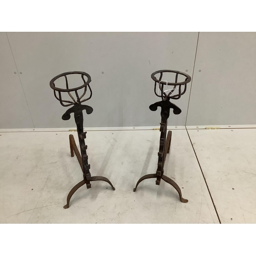 51 - A pair of wrought iron fire dogs, height 70cm. Condition - fair