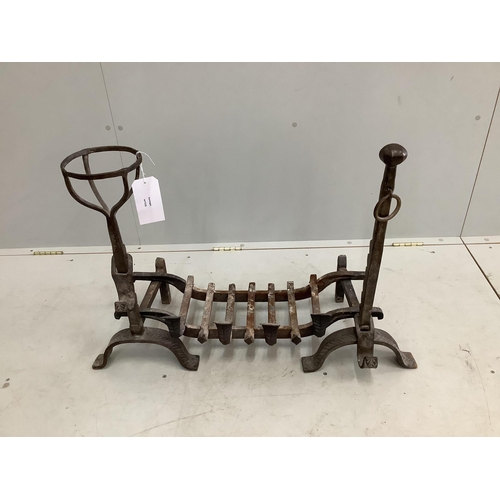54 - A pair of wrought iron fire dogs and grate, width 82cm, depth 36cm, height 62cm. Condition - good... 