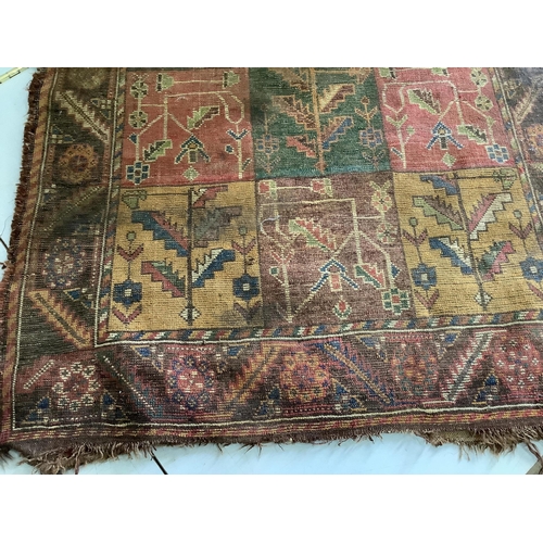 59 - An antique Baktiari rug, 180 x 108cm. Condition - fair