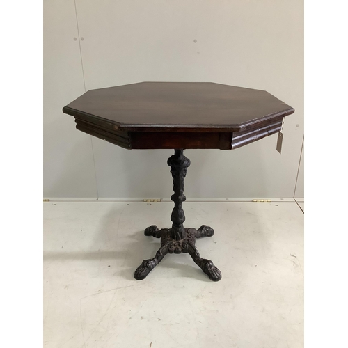 62 - A late Victorian octagonal mahogany and cast iron centre table, width 75cm, height 72cm.  Condition ... 